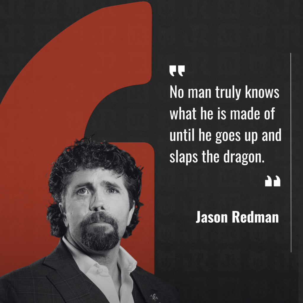 Portrait of Jason Redman in a suit, with a quote about a man's true strength being revealed by facing challenges head-on.