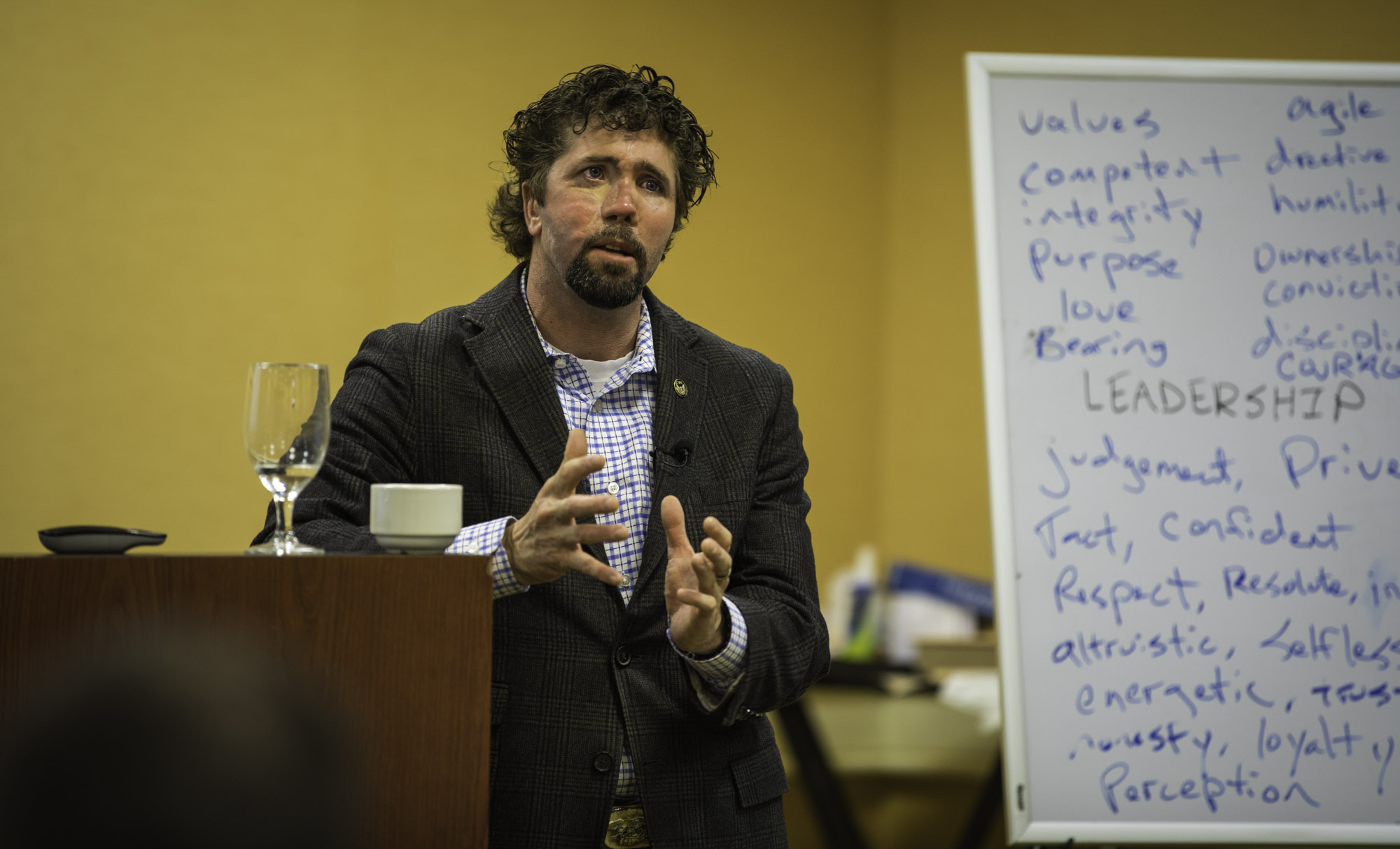 An image of Jason Redman on the stage explaining some of his best public speaking tips
