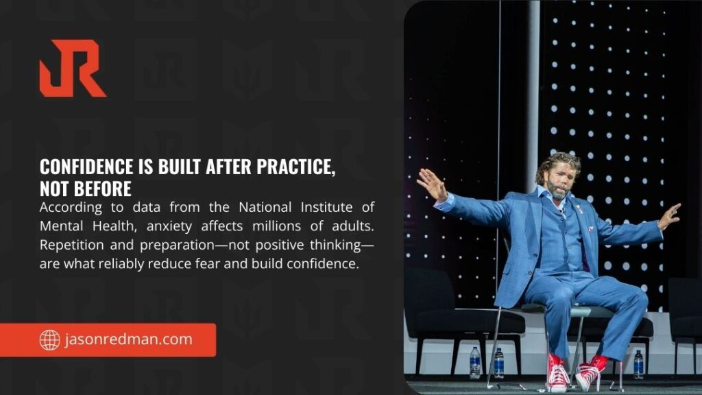 Speaker gesturing expressively on stage during presentation; infographic about confidence built after practice not before by Jason Redman.