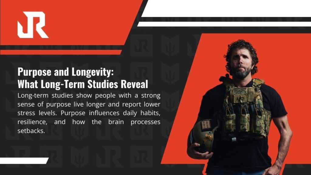 Jason Redman, bearded retired Navy SEAL, standing confidently in tactical vest and helmet under arm, intense gaze, against bold red and black branded background.